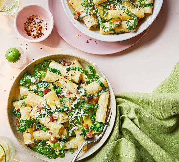 Creamy spring greens rigatoni with lemon, bacon & chilli